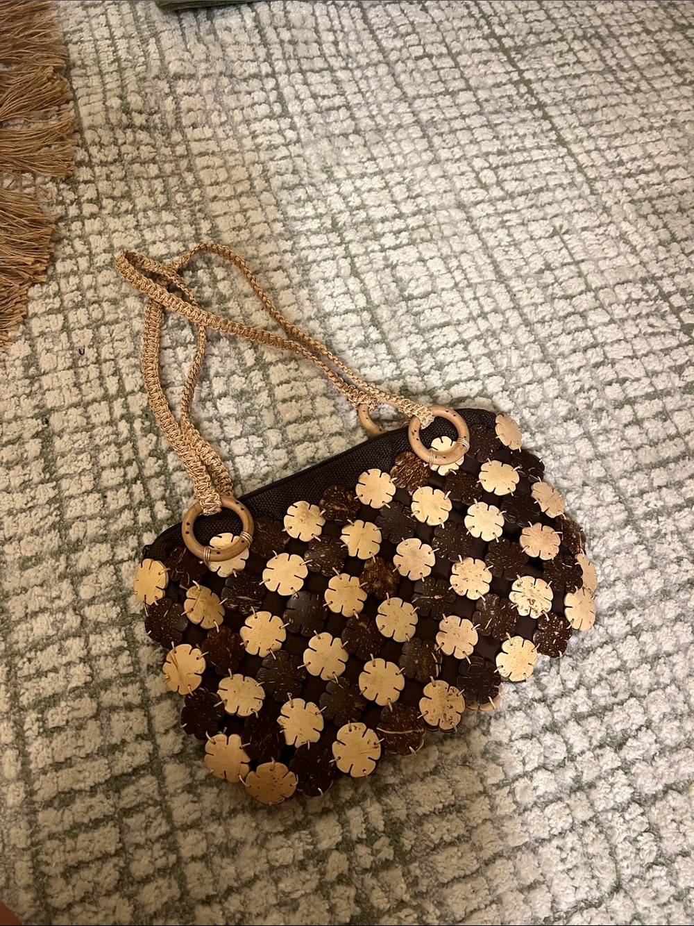 Hand Woven Brown Shoulder Bag with Wooden Floral Appliqué and Ring Accents